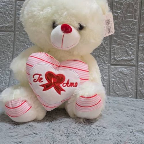 Oso de peluche blanco con un corazón rosa y blanco que dice "Te Amo" de 30cm