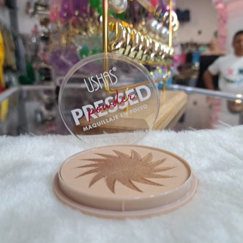Polvo compacto bronceador de la marca Ushas, conocido como "Bronzer Pressed Powder"