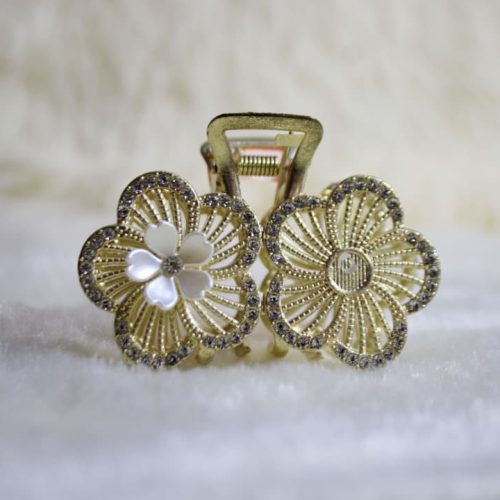 Pinza para cabello con diseño florar dorado
