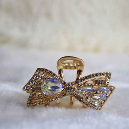 Pinza elegante para el cabello con pedrería dorada