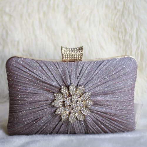 Cartera de noche de colores brillantes y broche con diseño de flor de diamantes