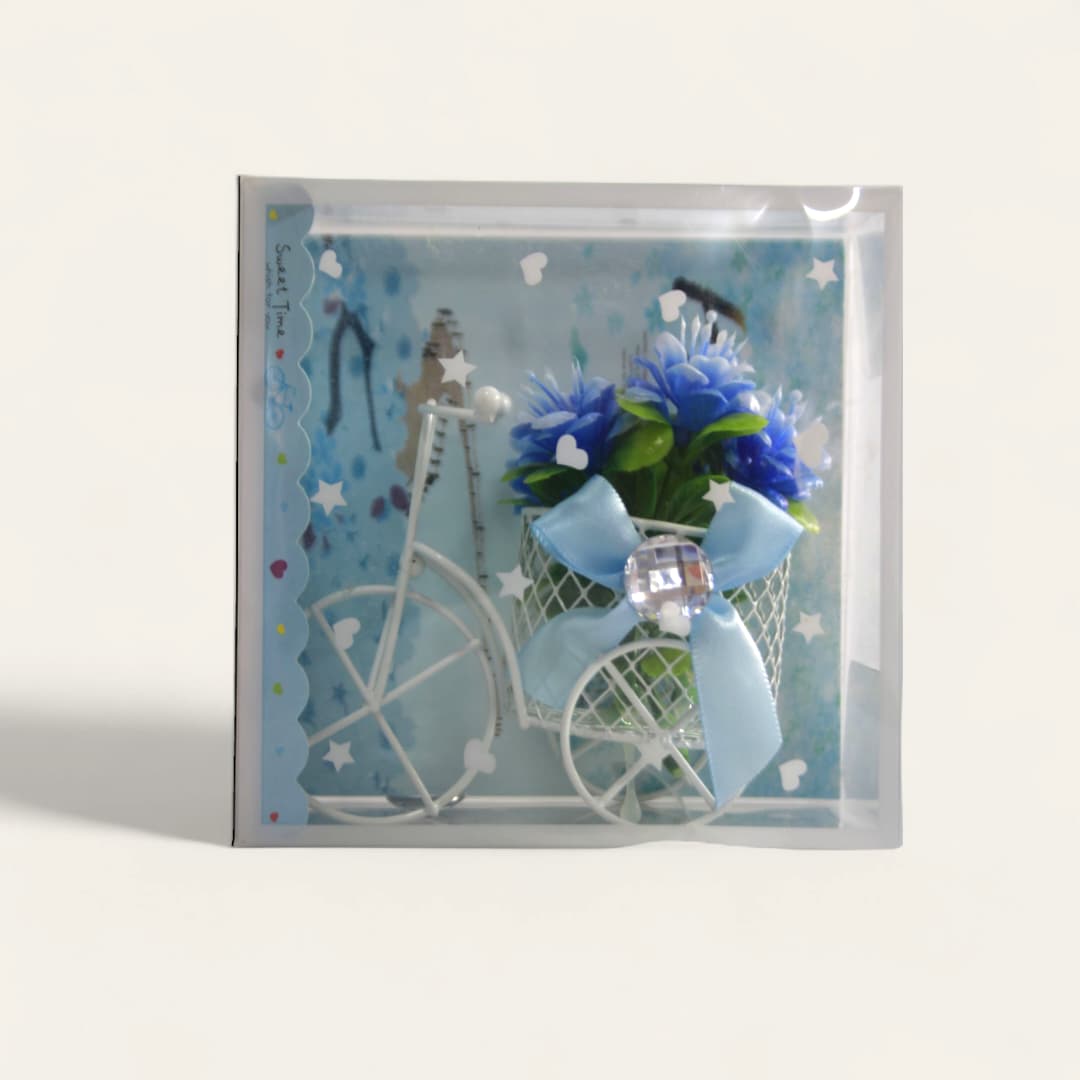 Artículo de regalo o de decoración, comúnmente conocido como "mini bicicleta de flores"